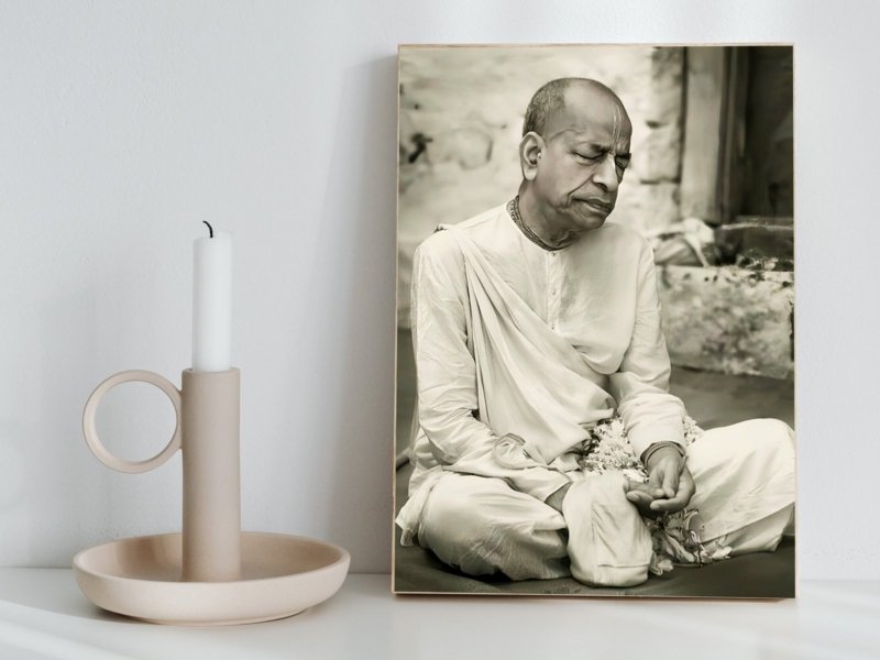 sadhu in contemplation canvas wall art shown framed on a wall