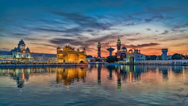 golden temple at dusk canvas wall art