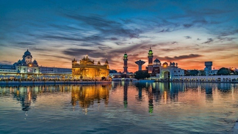 golden temple at dusk canvas wall art