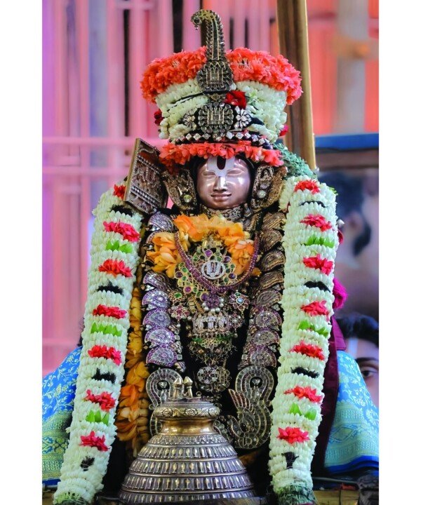 utsava deity in garlands canvas wall art